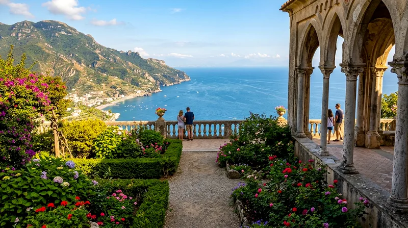 Villa Rufolo's terraced garden with arched colonnade overlooking Minori and the Tyrrhenian Sea far below